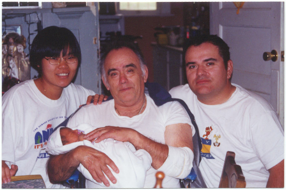 baby with grandpa, mommy and daddy; Actual size=240 pixels wide